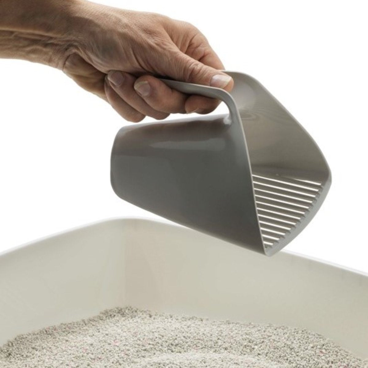 Moderna Scoop & Sift cat litter scoop showing the top handle in use