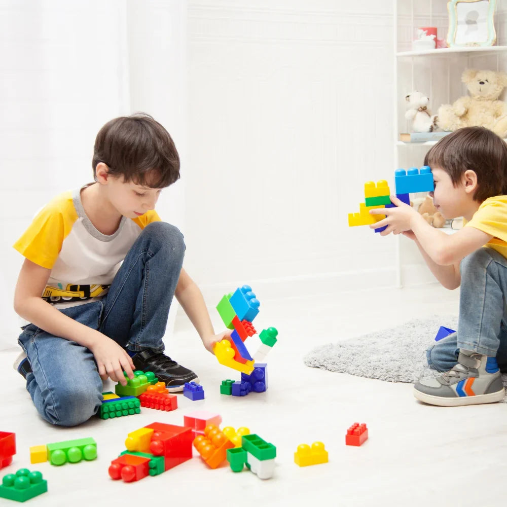 Two boys playing with toys on the floor - Children’s Toys - Afrishon World