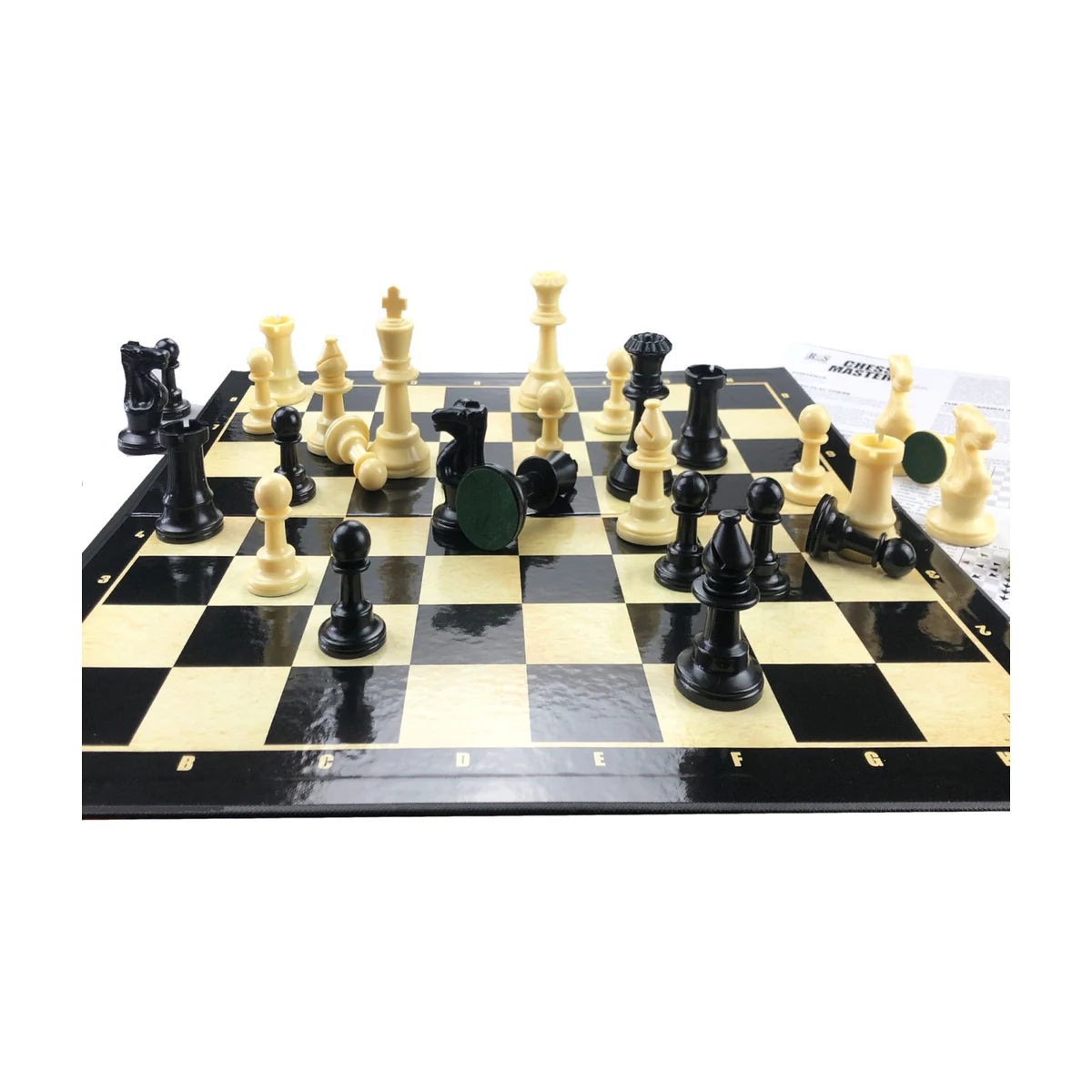 Chess set on tournament board with pieces and Afrikaans and English instruction sheet