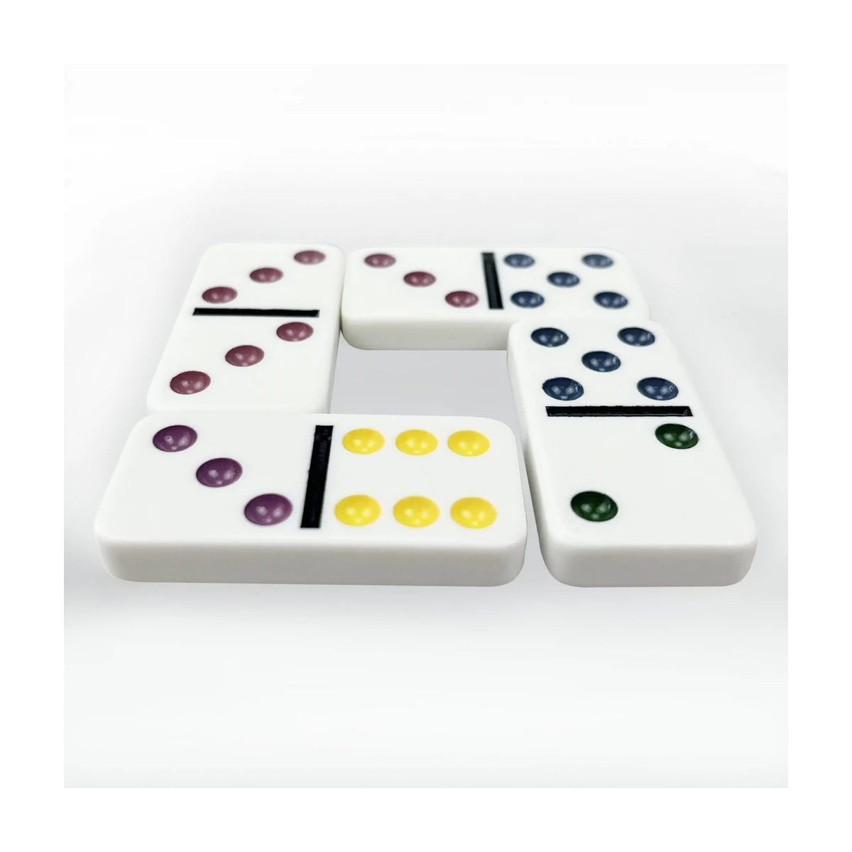 Close-up double-six domino tiles showing colour dot design and smooth edges