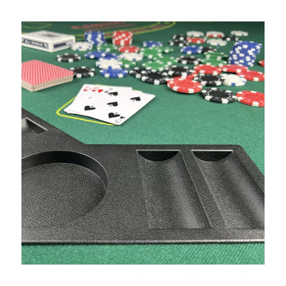 Close up of poker table cup holder and chip tray with textured edge rail on green felt