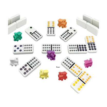 Top-down Mexican Train Dominoes layout showing central hub, double-12 domino tiles, train markers and train stations