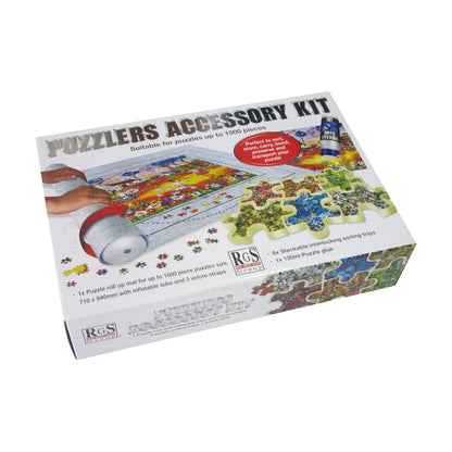 Puzzle accessory kit retail box packaging showing roll-up mat, trays and glue included