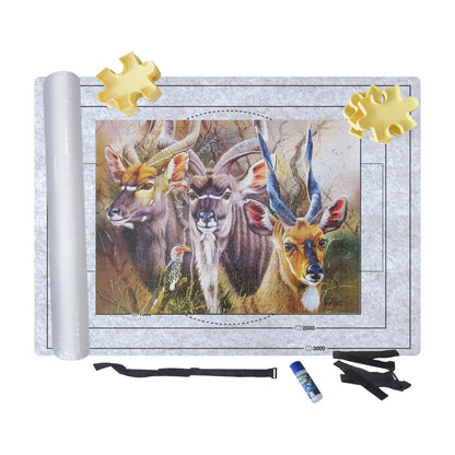 Puzzle roll-up felt mat shown with a jigsaw puzzle in progress and accessory pieces on the mat