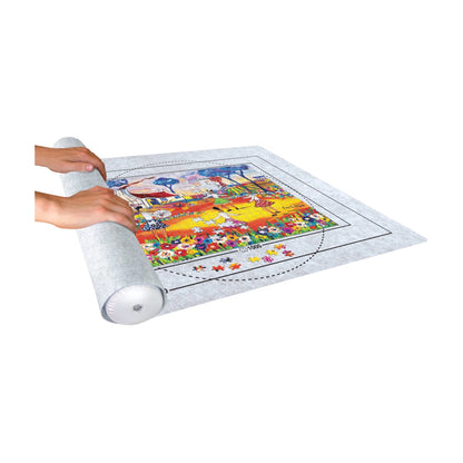 Hands rolling up a jigsaw puzzle on a felt puzzle mat for safe storage and transport