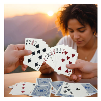 People playing cards at sunset using Royal Magic Svengali trick deck for easy card magic
