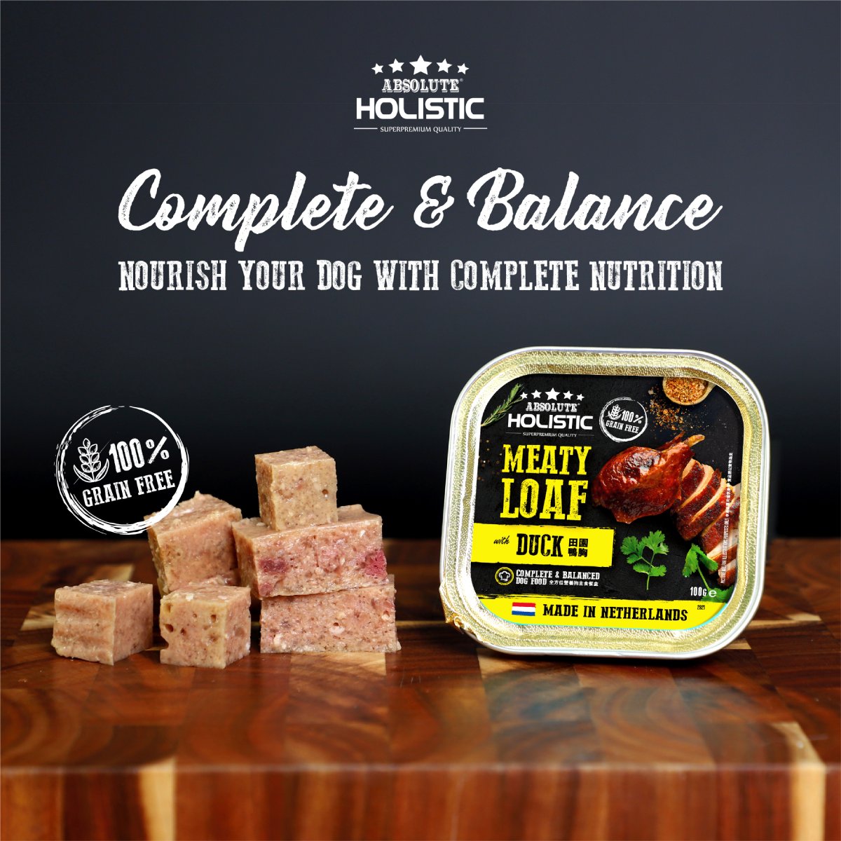 Absolute Holistic Duck Meaty Loaf 100g grain-free dog food tray with loaf cubes and complete nutrition message