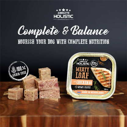 Dog eating Absolute Holistic Meaty Loaf with added minerals and vitamins message