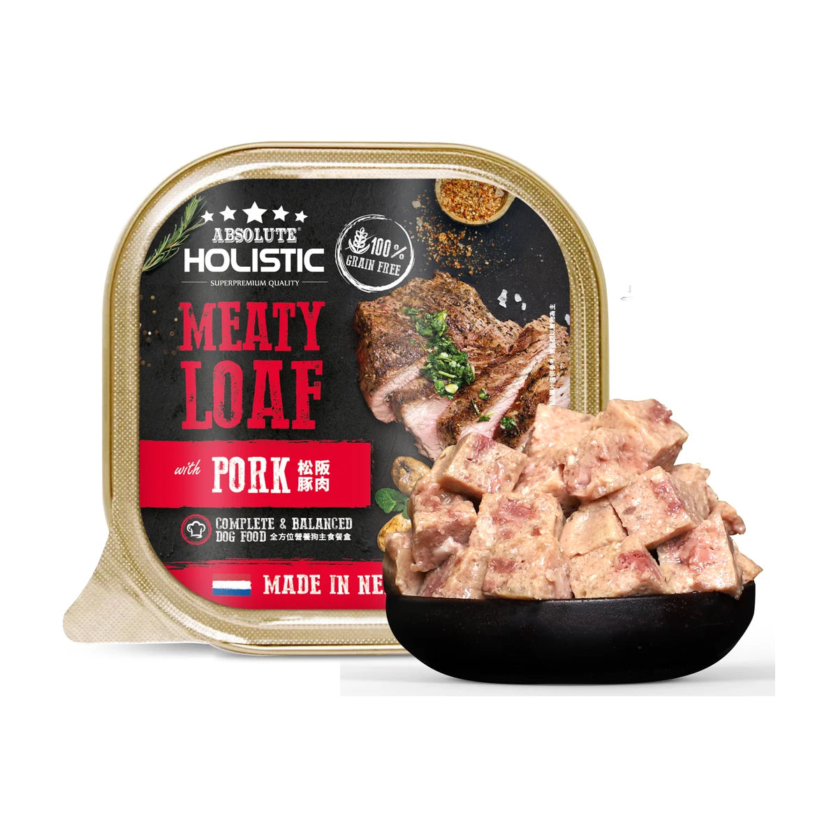 Absolute Holistic Meaty Loaf with Pork 100g tray beside a bowl of cubed loaf