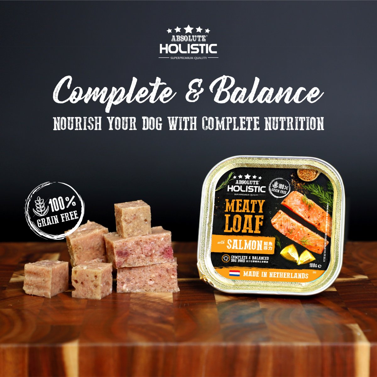 Absolute Holistic Salmon Meaty Loaf promotional image with a grain-free badge and complete nutrition message