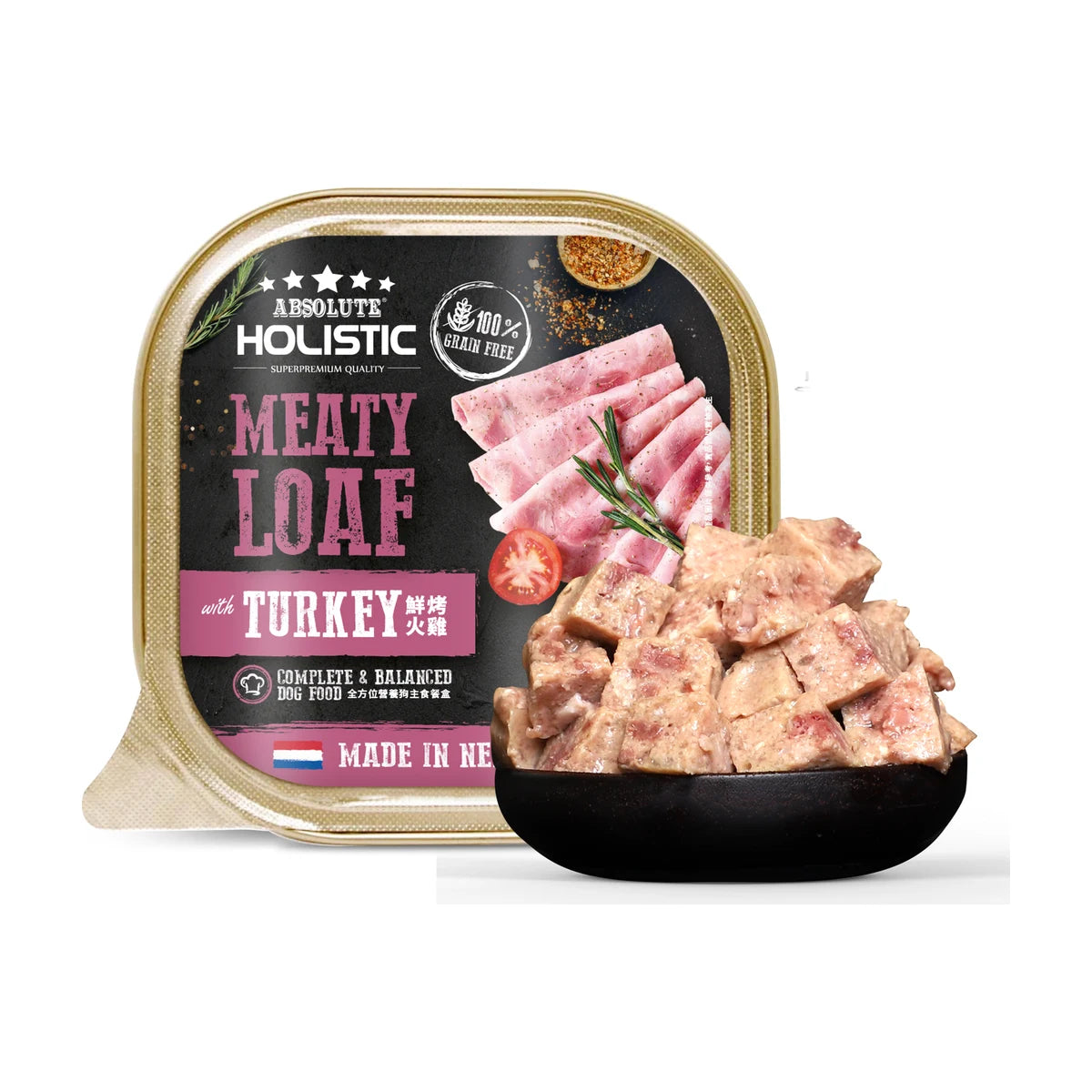 Absolute Holistic Meaty Loaf Turkey 100g tray beside a bowl of cubed loaf