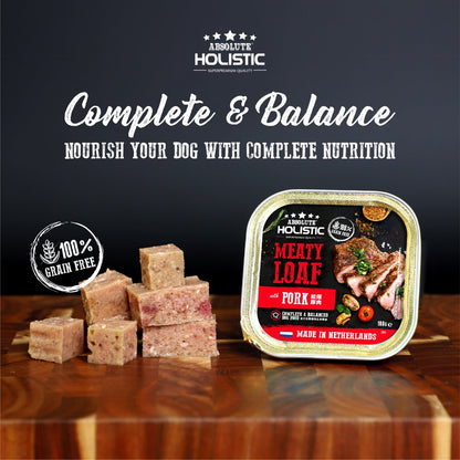 Absolute Holistic Pork Meaty Loaf 100g grain-free dog food tray with loaf cubes and complete nutrition message