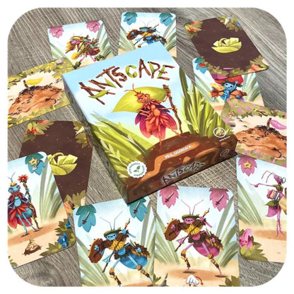 Antscape Card Game box surrounded by illustrated ant and territory cards during play