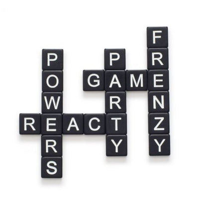 Bananagrams Party Edition close-up of black letter tiles arranged into words