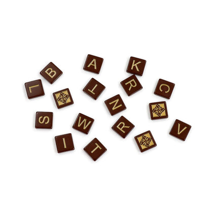 Bananagrams Signature Edition brown and gold letter tiles close-up