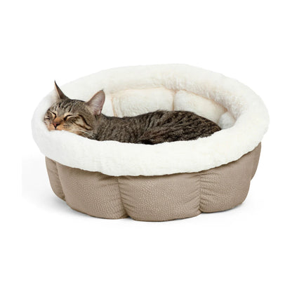 Tabby cat sleeping in the Best Friends by Sheri Cuddle Cup Ilan Mini bed in Wheat, resting against the plush faux fur rim and cushioned walls.
