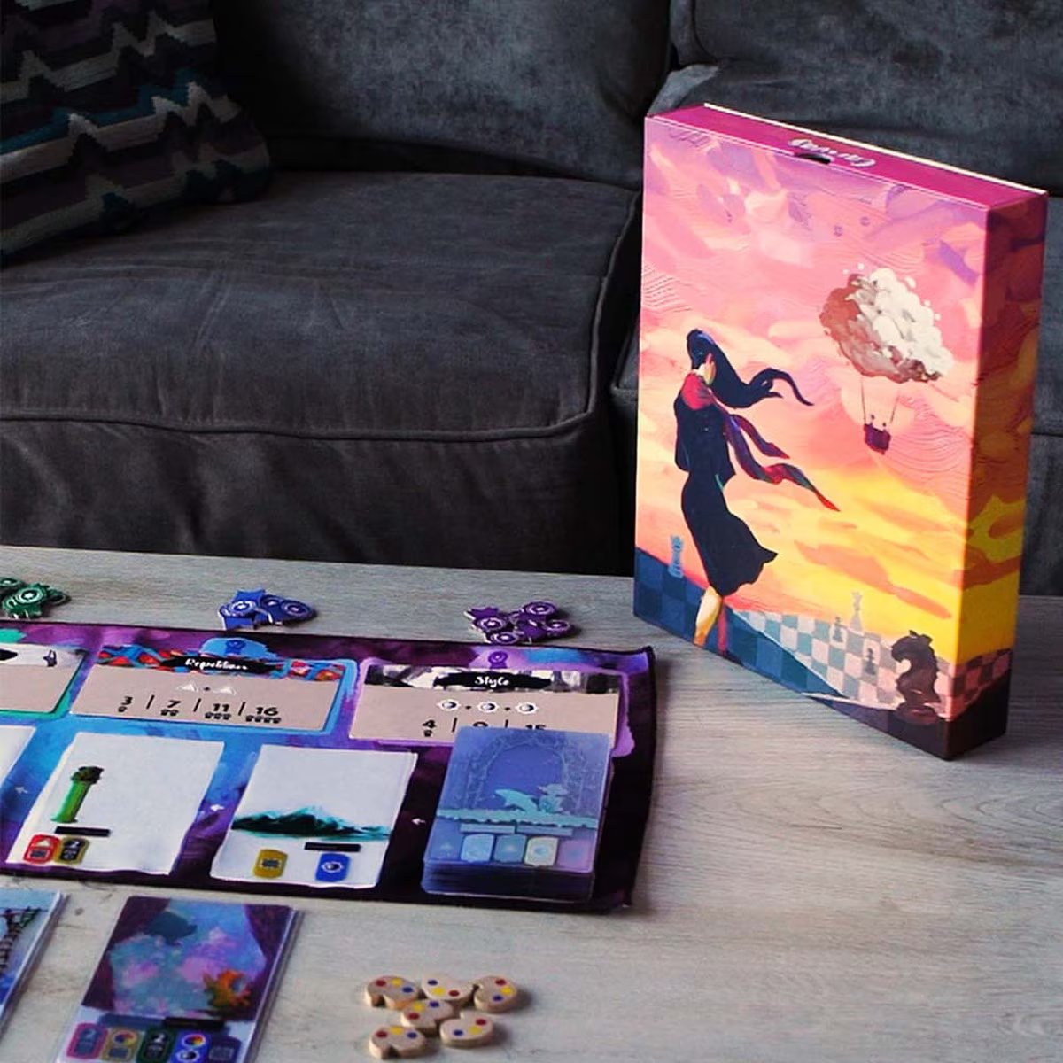 Canvas board game set up on table with box and components