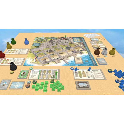 Cape May strategy board game setup showing the city board player areas buildings cards and tokens