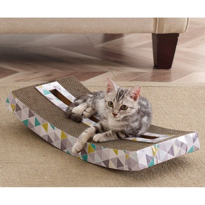 Cat resting on Catstages Scratch and Rock cardboard scratcher