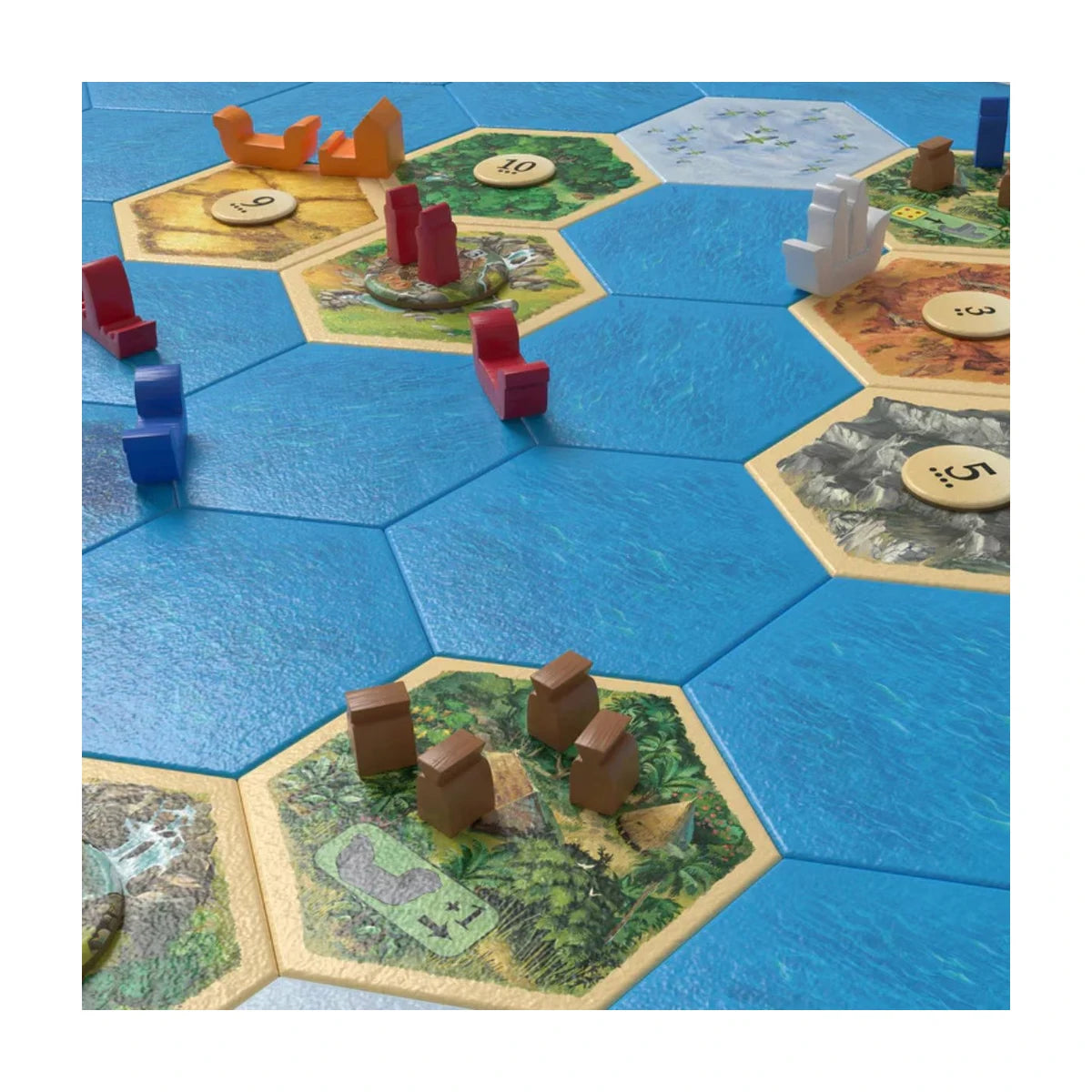 Catan Explorers and Pirates 6th Edition gameplay close-up showing ships, island tiles, settlements and sea exploration pieces