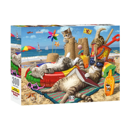 Cats on the Beach 300 piece puzzle box showing cats relaxing on a sunny beach