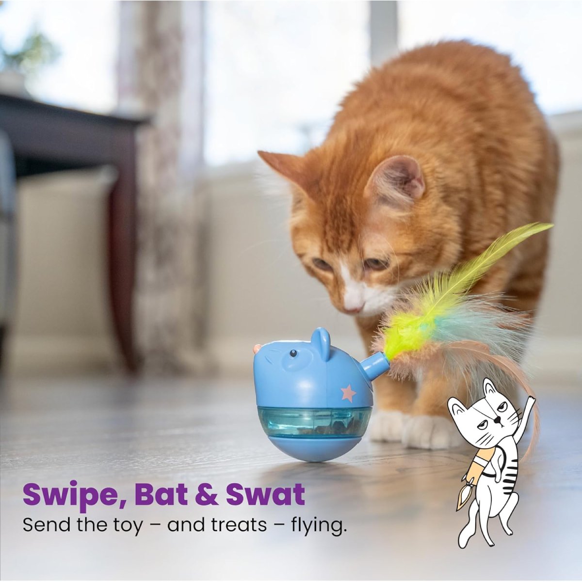 Cat swatting the Catstages Hunt n' Swat Treat Tumbler during interactive treat play
