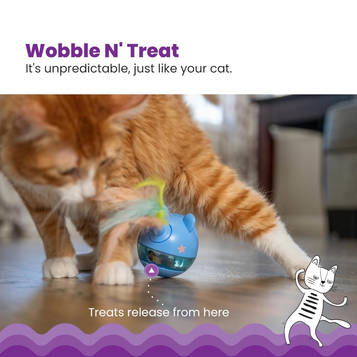 Cat batting the Catstages Hunt n' Swat Treat Tumbler as treats release from the toy