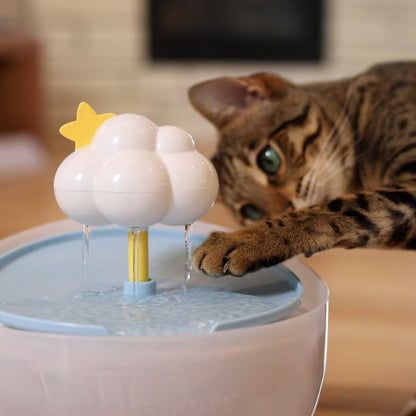 Cat drinking from Catstages Purrfect Rain Water Fountain