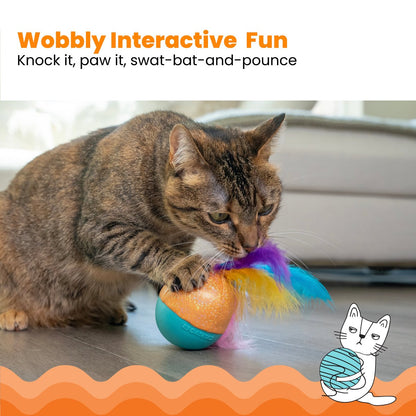 Catstages Whack N’ Wobble Ball interactive cat toy being pawed by a cat