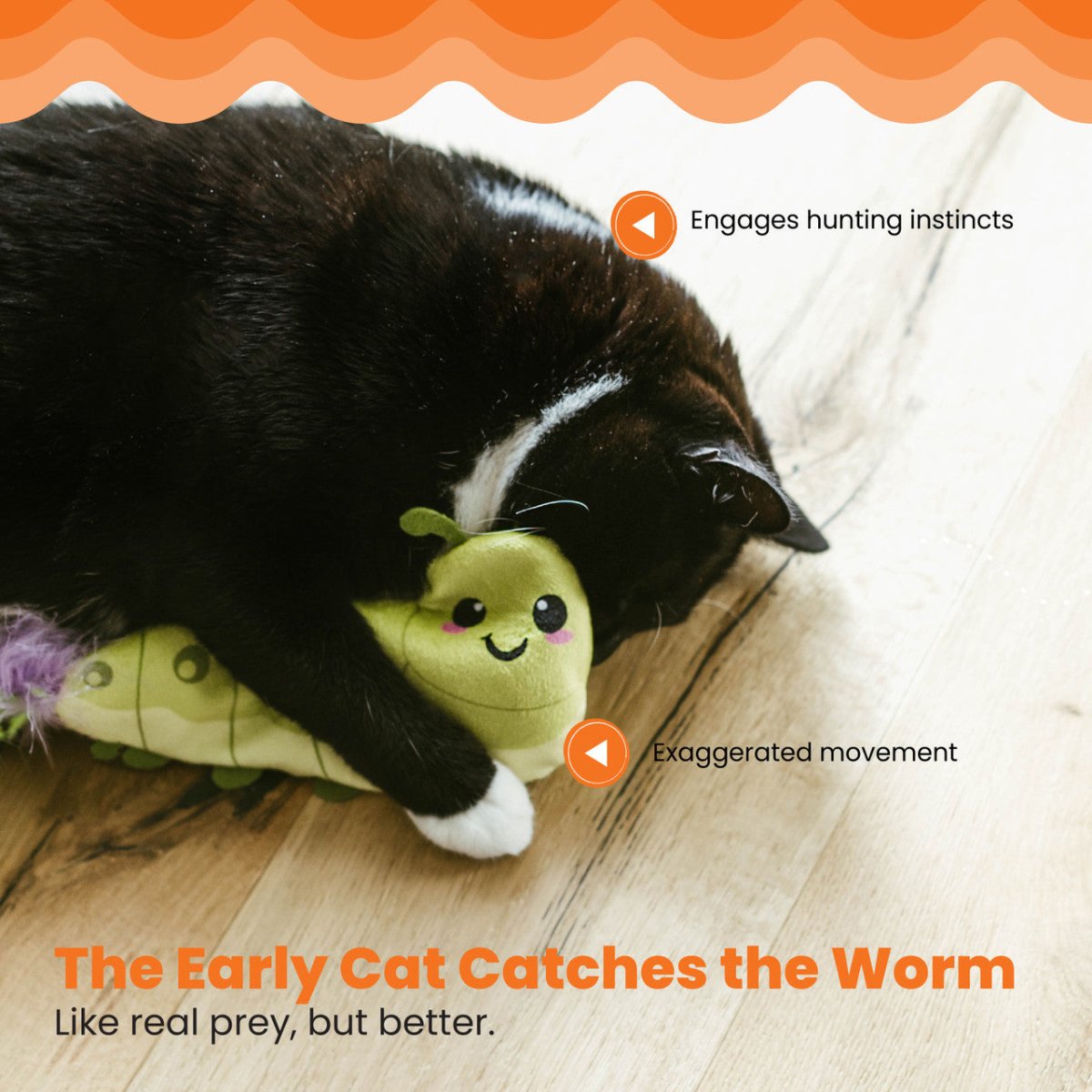 Cat playing with Catstages Wiggle Worm electronic cat toy designed to encourage hunting instincts and movement play.