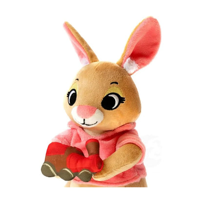 Close-up of Everdell Cozy Critters Toymaker plush with embroidered face and toy train