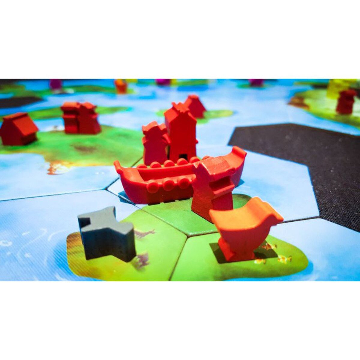 Explorers of the North Sea Rocks of Ruin gameplay with Viking longship and structures on island tiles