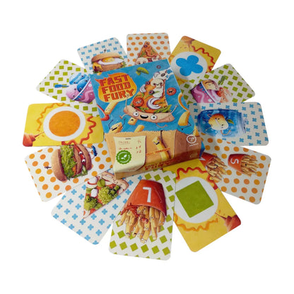 Fast Food Fury card game box surrounded by colourful fast food, shape and matching cards