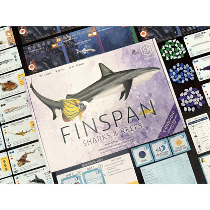 Finspan Sharks & Reefs Expansion box with game components, cards, coral tokens and reef overlays