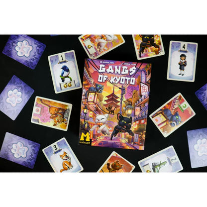 Gangs of Kyoto card game box surrounded by illustrated cat cards