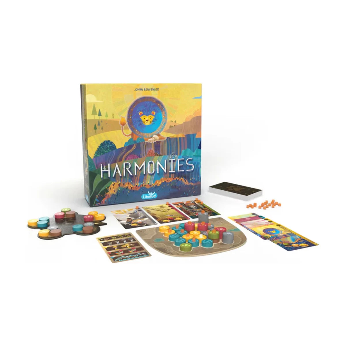 Harmonies board game setup with colourful landscape tokens, animal cards, player board and game components