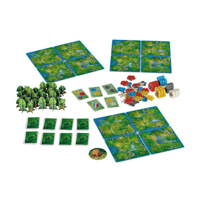 HUTAN Life in the Rainforest game components with flower cards, trees, animals, rainforest boards and tokens