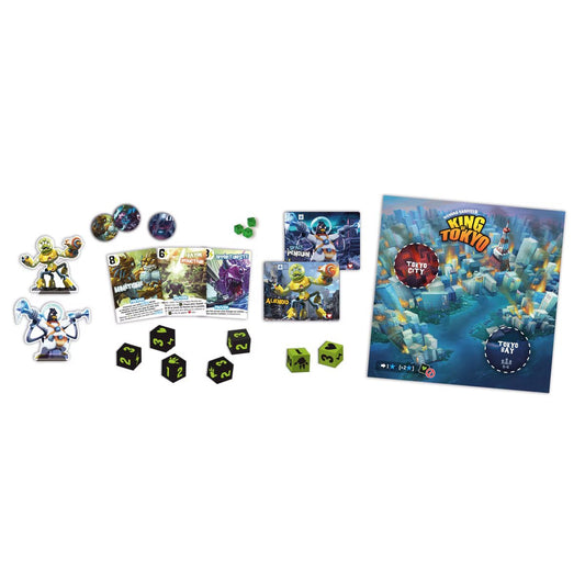 King of Tokyo 2016 Edition components layout with monster standees, dice, power cards, energy cubes and Tokyo board