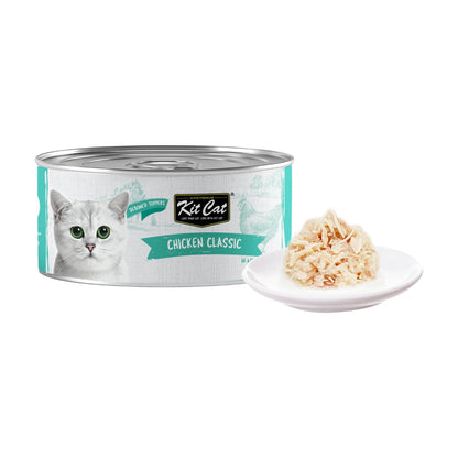 Kit Cat Chicken Classic Aspic can beside tender chicken flakes on a white plate
