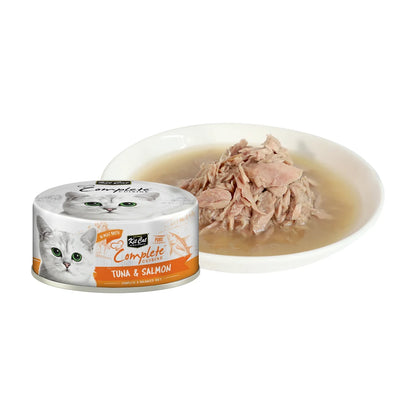Kit Cat Complete Cuisine Tuna and Salmon can beside seafood flakes in broth