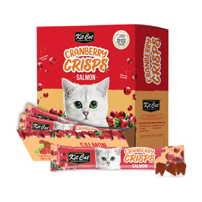 Kit Cat Cranberry Crisps Salmon Cat Treats bulk box containing 50 x 20g sachets, displayed with an individual salmon-flavoured treat packet and three tooth-shaped crunchy treats.