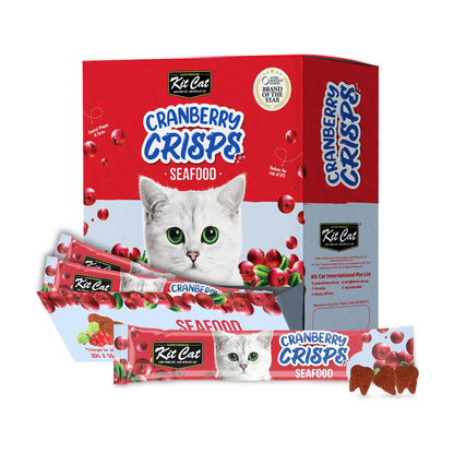 Kit Cat Cranberry Crisps Seafood Cat Treats bulk box of 50 x 20g sachets displayed with an individual seafood-flavoured sachet and three crunchy tooth-shaped treats.