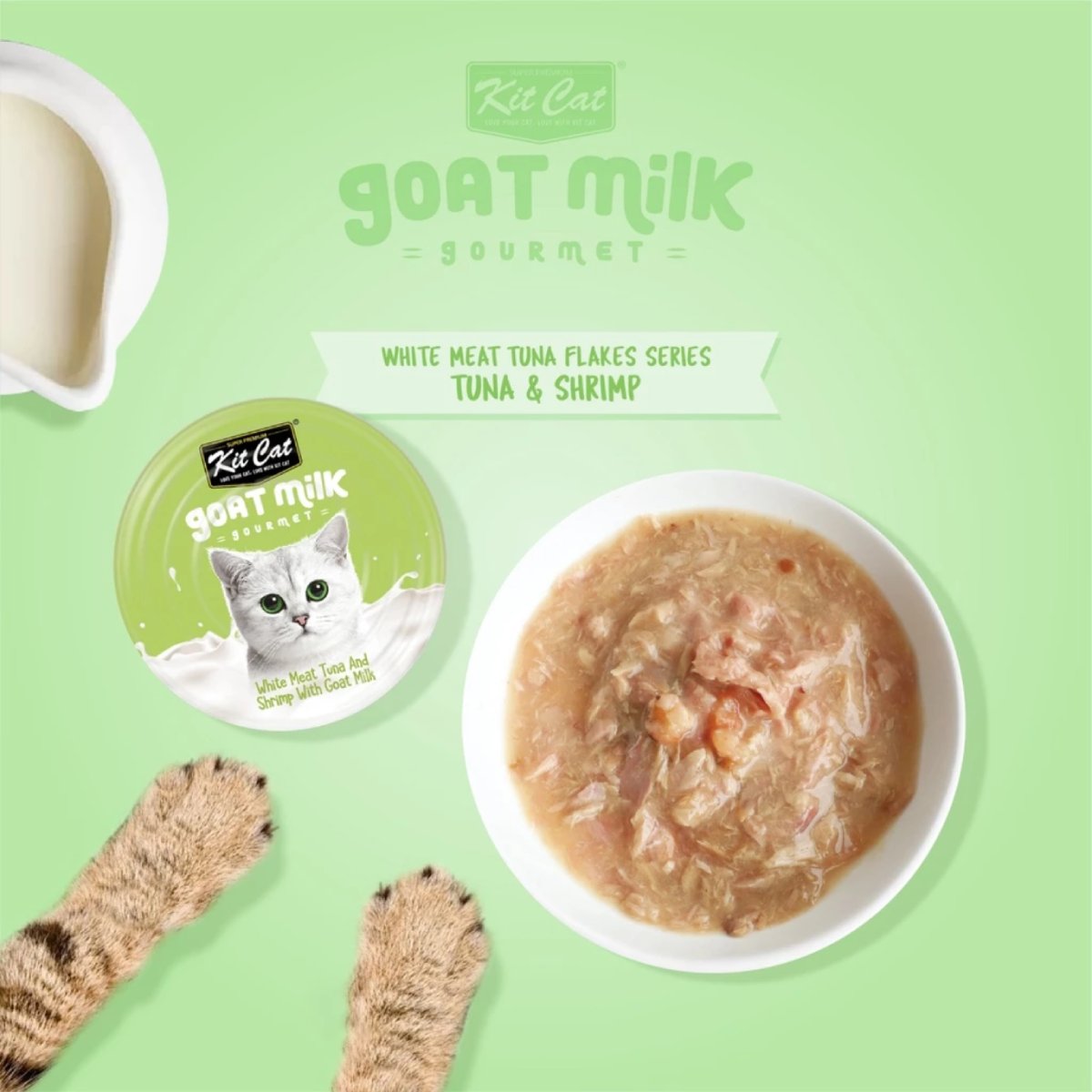 Kit Cat Goat Milk Gourmet Tuna and Shrimp wet cat food can beside a bowl showing the food texture