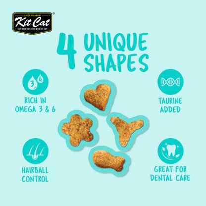 Four Kit Cat Kitty Crunch Lamb treat shapes with taurine Omega 3 and 6 hairball and dental-care benefits