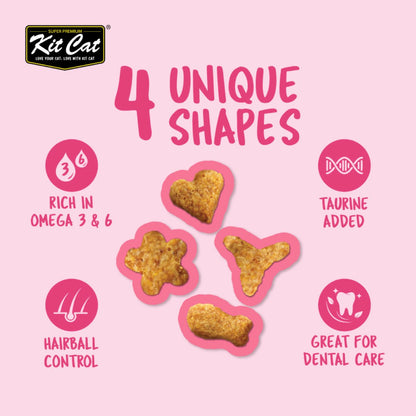 Four Kit Cat Kitty Crunch Tuna treat shapes with taurine Omega 3 and 6 hairball and dental care benefits