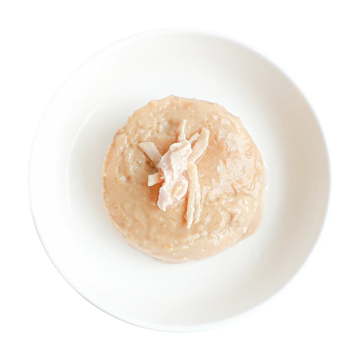 Smooth Kit Cat tuna mousse with chicken topping served on a white plate