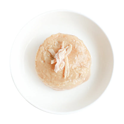 Smooth Kit Cat tuna mousse with chicken topping served on a white plate