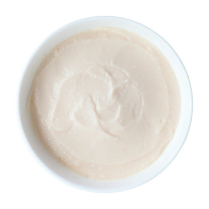 Kit Cat Purr Puree Plus Chicken and Collagen Care smooth lickable puree in bowl