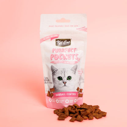 Kit Cat Purrfect Pockets Hairball Control cat treats pouch with treats displayed in front