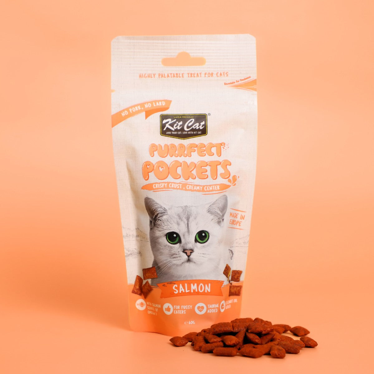 Kit Cat Purrfect Pockets Salmon cat treats pouch with salmon treats displayed in front